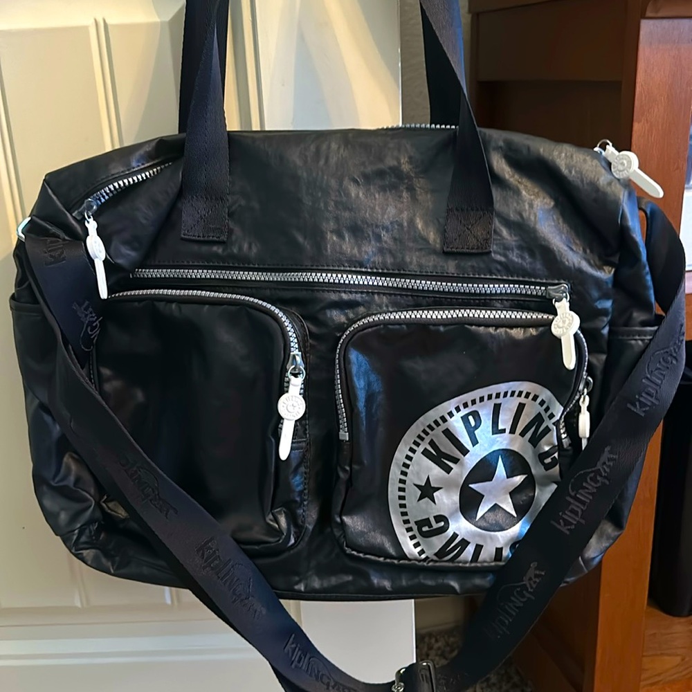 Kipling black messenger-style tote